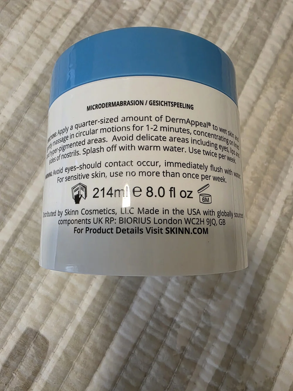 SKINN White Jar with Blue Lid Exfoliating Cream